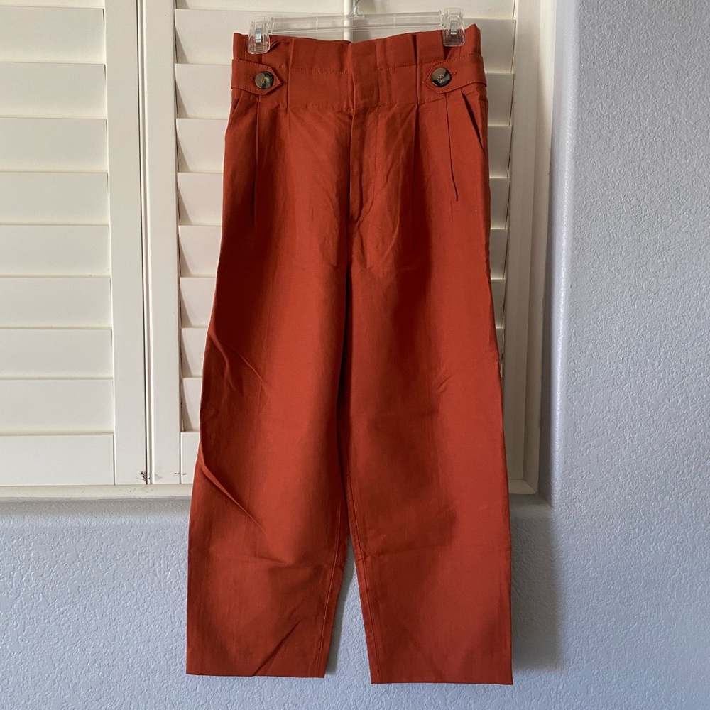 Zara paper bag orange trousers